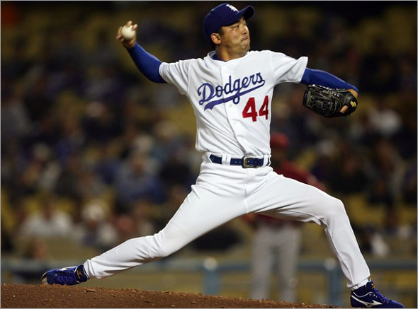 Takashi Saito of the Los Angeles Dodgers pitches against the Arizona Diamondbacks during the ninth inning on May 1, 2007 at Dodger Stadium in Los Angeles, 