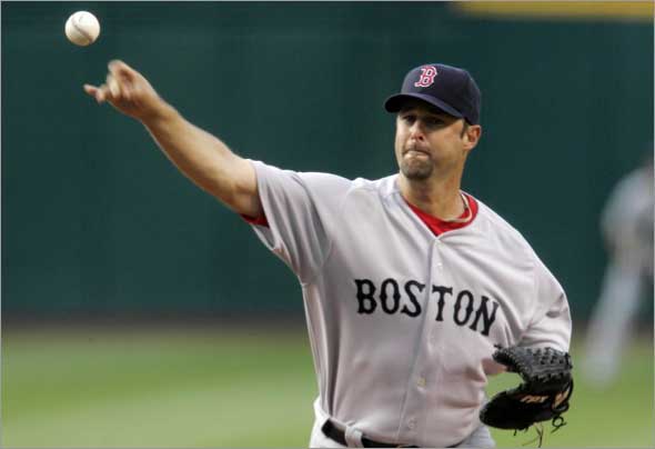 Red Sox's Tim Wakefield pitches to the Cleveland Indians in the first inning of a baseball game, Monday, April 27, 2009, in Cleveland. 