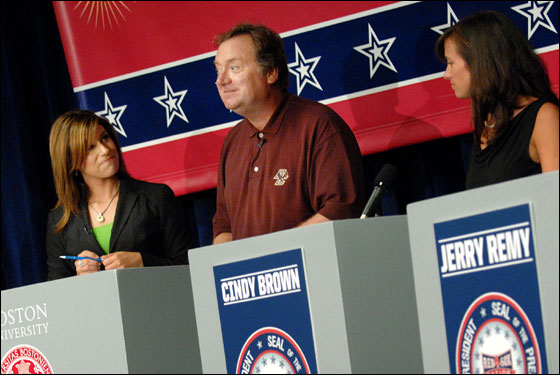 Tina Cervasio and Tim Russert, center, moderate a discussion among the candidates for the President of Red Sox Nation, as candidates Rob Crawford, left, and Cindy Brown, right, look on at Boston University on Thursday