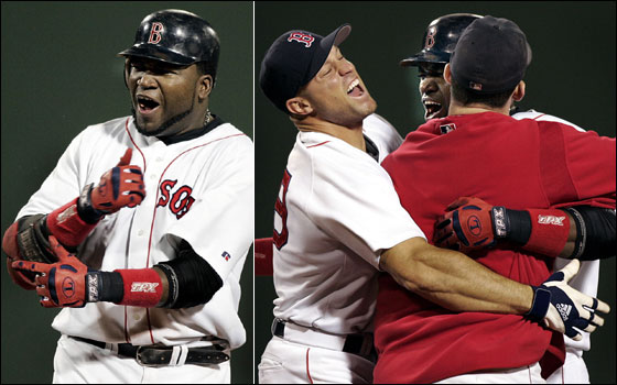 David Ortiz is mobbed by teammates Gabe Kapler and Trot Nixon following his game winning hit in the bottom of the 14th inning that gave Boston a 5-4 victory.