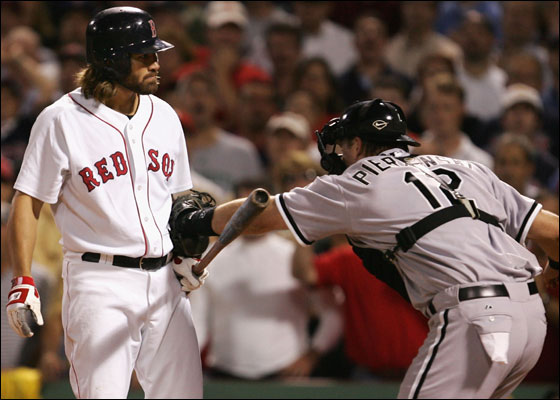 Catcher A.J. Pierzynski of the Chicago White Sox tags out Johnny Damon of the Red Sox after striking out to the end the inning with the bases loaded during Game Three of the American League Division Series at Fenway Park on October 7, 2005 in Boston, Massachusetts.