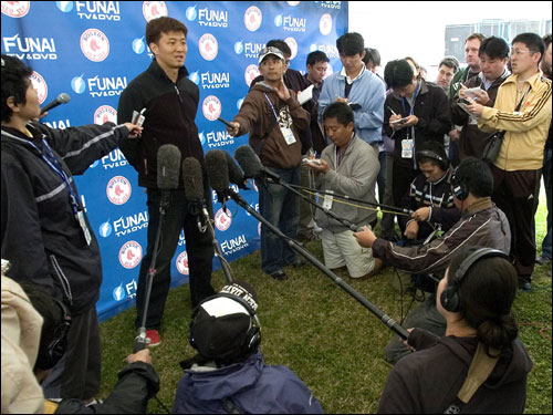 Boston Red Sox lefthanded pitcher Hideki Okajima of Japan talks to members of the media at the team's Player Development Complex in Fort Myers, Florida February 15, 2007. Pitchers and catchers report to spring training camp February 16 and have their first workout the next day.