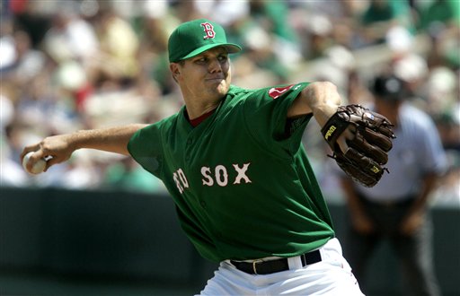 Red Sox starter Jon Papelbon, wearing green for St. Patrick's Day, delivers a throw in the second inning against the Florida Marlins during their spring training baseball game in Fort Myers, Fla., Friday March 17, 2006.
