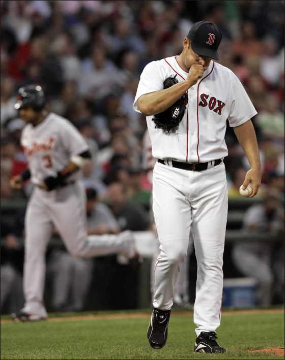 Red Sox starting pitcher Tim Wakefield reacts as Detroit Tigers' Gary Sheffield rounds third to score on Magglio Ordonez' three-run homer in the third inning of their baseball game at Fenway Park in Boston Tuesday, May 15, 2007. 