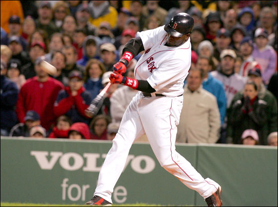 David Ortiz of the Boston Red Sox hits a three run home run in the eighth inning against the New York Yankees at Fenway Park on May 1, 2006 in Boston, Massachusetts.