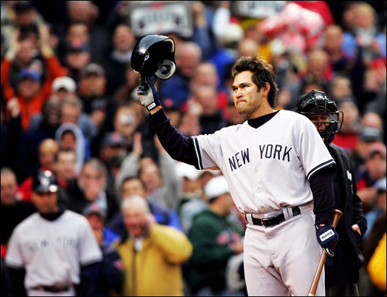 Johnny Damon of the New York Yankees acknowledges the crowd before his first at-bat against his former team, the Boston Red Sox, at Fenway Park May 1, 2006 in Boston, Massachusetts.