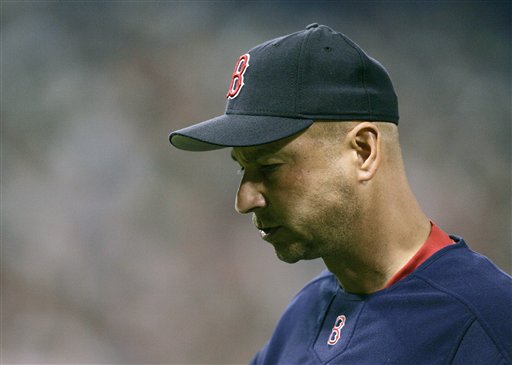 Boston Red Sox manager Terry Francona heads to the dugout after pulling relief pitcher Jermane Van Buren in the sixth inning against the Minnesota Twins in a baseball game Wednesday, June 14, 2006, in Minneapolis.