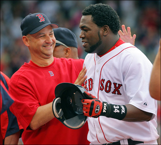 David Ortiz delivered yet another victory to the home team, as his single in the bottom of the 12th inning gave the Sox an 8-7 win over the Philadelphia Phillies at Fenway Park. Here manager Terry Francona can't keep the huge grin off his face as he congratulates Ortiz following the hit.