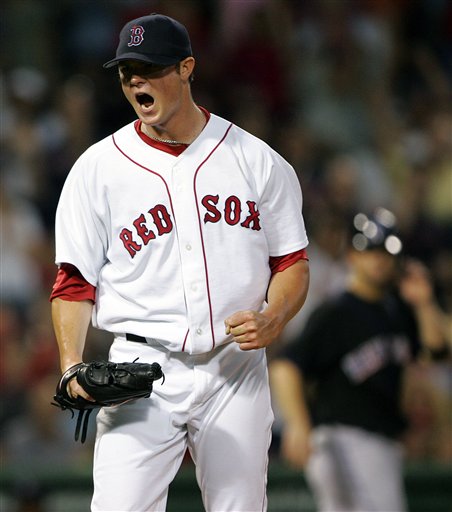 Red Sox pitcher Jon Lester yells after New York Mets' Chris Woodward struck out swinging to end the fourth inning of a baseball game, Tuesday, June 27, 2006, in Boston.