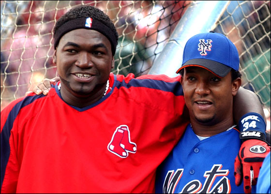 Red Sox's David Ortiz, left, and New York Mets' Pedro Martinez chat before the start of a major league baseball game Tuesday, June 27, 2006 in  Boston. This was the first game at Fenway Park for Martinez who left the Red Sox for the Mets last season.