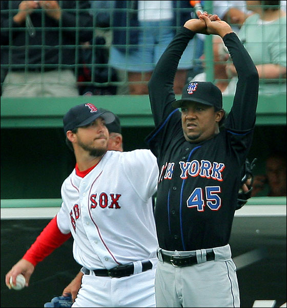 Pedro stretches out near Josh Beckett prior to his short stint at Fenway