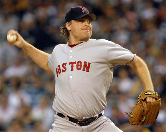 Boston Red Sox starting pitcher Curt Schilling throws a pitch to the New York Yankees in the first inning of their American League baseball game in New York's Yankee Stadium, June 8, 2006.