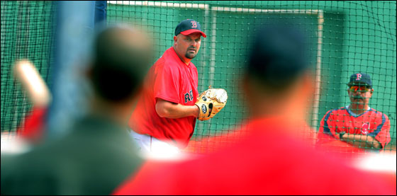 Red Sox pitcher David Wells didn't have much of an audience in the stands as he threw a simulated game this morning at Fenway Park as he tries to get back onto the roster from the disabled list. But he did have some interested observers on the field, as GM Theo Epstein (left from behind, manager Terry Francona (next to Epstein) and interim pitching coach Al Nipper (far right) watched.