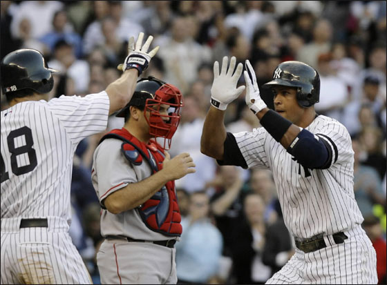 New York Yankees' Alex Rodriguez celebrates with Johnny Damon who scored on Rodriguez's second-inning, two-run home run off Boston Red Sox's Tim Wakefield in their baseball game at Yankee Stadium in New York, Monday, May 21, 2007.