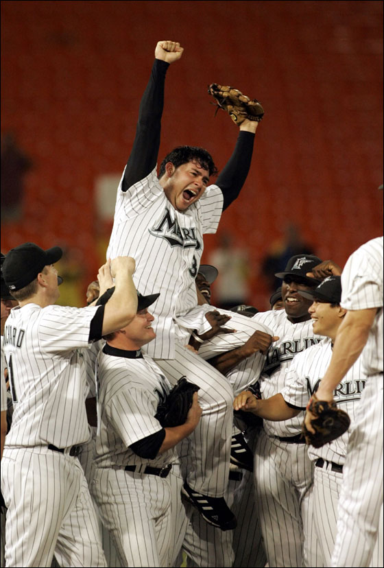 Florida Marlins pitcher Anibal Sanchez of Venezuela is hoisted atop his teammates' shoulders as they celebrate his 2-0 n0-hit win over the Arizona Diamondbacks Wednesday, Sept. 6, 2006, at Dolphin Stadium in Miami.