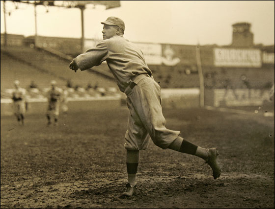Red Sox pitcher Babe Ruth warms up prior to a 1915 World Series game start in Philadelphia's Shibe Park. The photo, printed from a 4x5 glass plate is part of a baseball exhibit at the Panopticon Gallery inside the Commonwealth Hotel in Kenmore Square.