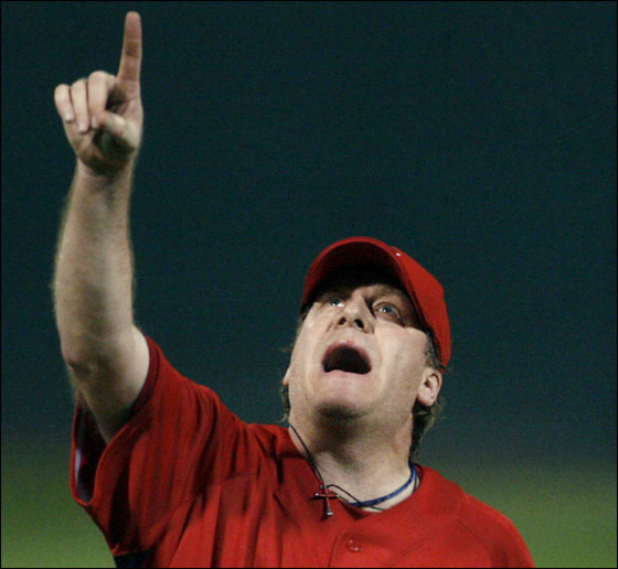Curt Schilling points at a first inning pop up during the Red Sox Exhibition season oepning game vs. the Twins at City of Palms Park.