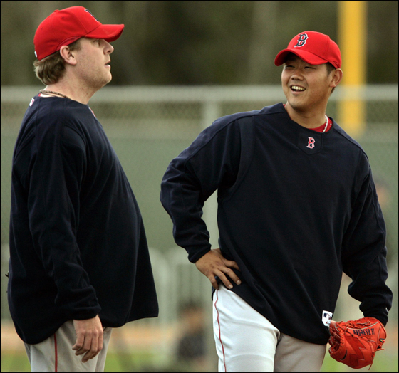 Boston Red Sox pitchers Schilling and Matsuzaka share a laugh on the first day of full practices in Fort Myers. Boston Red Sox pitchers Curt Schilling (L) and Daisuke Matsuzaka of Japan share a laugh on the first day of full practices at the team's spring training facility in Fort Myers, Florida February 18, 2007.