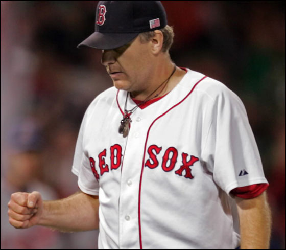 The Boston Red Sox pitcher Curt Schilling pumps his fist after pitching 7 innings against the Cleveland Indians at Fenway Park Monday May. 28 2007.
