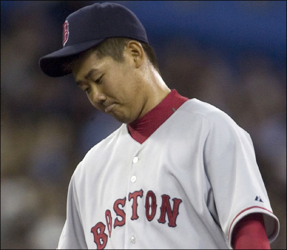 Red Sox starting pitcher Daisuke Matsuzaka stands on the mound during the fourth inning baseball action against the Toronto Blue Jays in Toronto, Tuesday, April 17, 2007. 