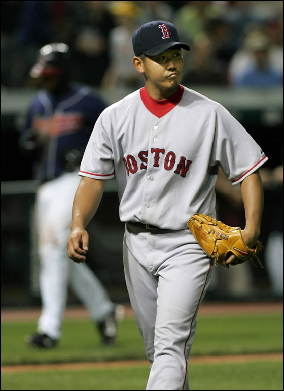 Red Sox pitcher Daisuke Matsuzaka walks off the field after getting Cleveland Indians' Casey Blake to fly out to end the seventh inning of a baseball game Tuesday, July 24, 2007, in Cleveland.
