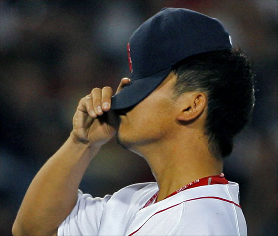Red Sox pitcher Daisuke Matsuzaka feels the heat during the fifth inning as the Indians are scoring the first two of the six runs he would give up in the game.