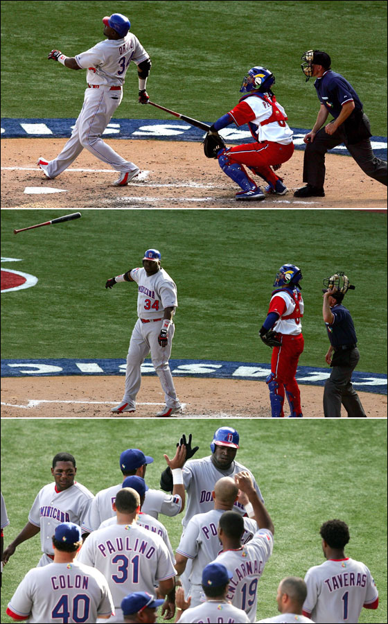 David Ortiz follows through for a solo-home run to right field off team Cuba reliever Jonder Martinez in the fifth inning in Round 2 of the World Baseball Classic in San Juan, Puerto Rico, Monday, March 13, 2006