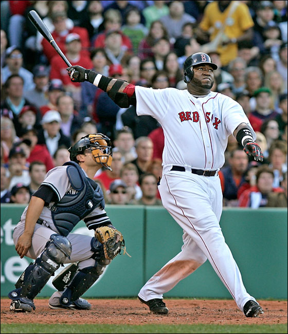 Boston Red Sox designated hitter David Ortiz watches the flight of his fourth inning two-run home run.