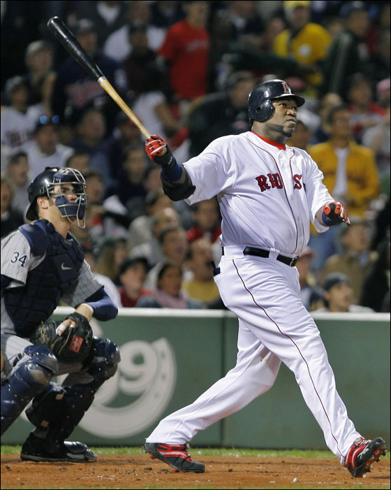 David Ortiz follows through after hitting his 51st home run of the season during a baseball game against the Minnesota Twins at Fenway Park in Boston Thursday night, Sept. 21, 2006. Fifty-one home runs is the most by any Red Sox player in a single season.