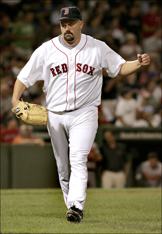 David Wells walks off the field after completing 7 innings of shutout baseball against the Orioles. 
