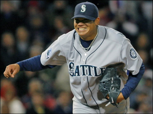 Seattle pitcher Felix Hernandez reacts following the final out of his one hitter.