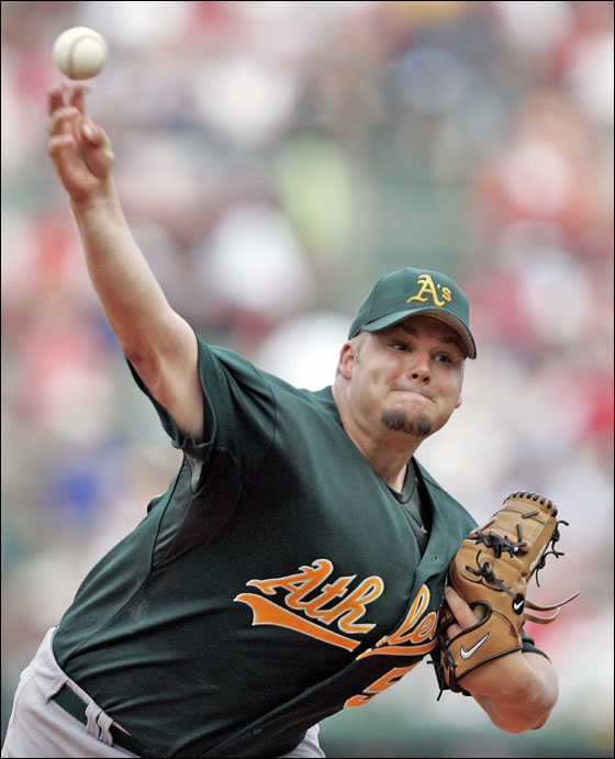 Oakland Athletics Joe Blanton pitches against the Boston Red Sox during the first inning of their MLB baseball game at Fenway Park in Boston, Massachusetts July 16