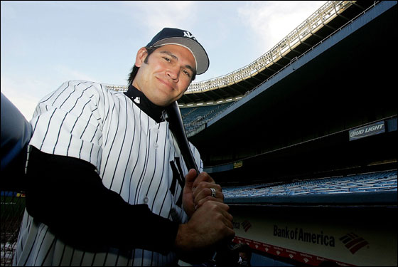 Johnny Damon of the New York Yankees poses in the Yankee Dugout after being introduced as the new Yankee center fielder on December 23, 2005 at Yankee Stadium in the Bronx Borough of New York City.