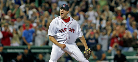 Red Sox closer Jonathan Papelbonhowls as he strikes out Todd Helton swinging to end the game and preserve Tim Wakefield's 2-1 victory over the Rockies.