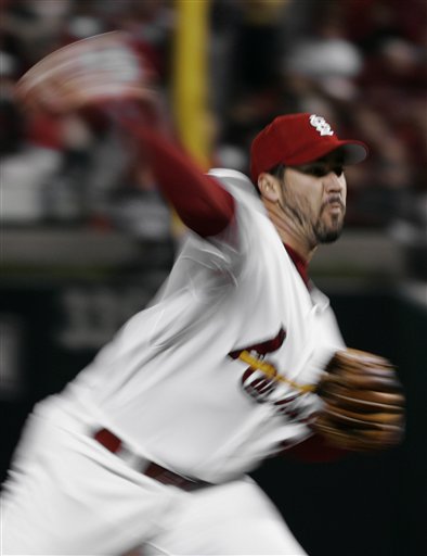 St. Louis Cardinals' Jeff Suppan is a whirl of motion as he pitches against the New York Mets in the third inning of Game 3 of the National League Championship Series Saturday, Oct. 14, 2006, in St. Louis.