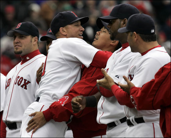 Julian Tavarez greets Sox pitcher Dice-K Matsuzaka during Opening Day ceremonies at Fenway Park