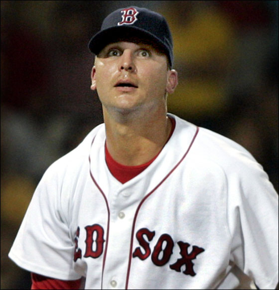 6.28.05: Red Sox closer Keith Foulke turns and wears a shocked look as he follows the flight of Travis Hafner's ninth inning grand slam that sent Boston to a 12-8 defeat.