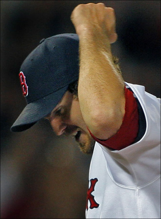 Red Sox starting pitcher Kason Gabbard is all smiles as he pumps his fist after getting the last out of the game.