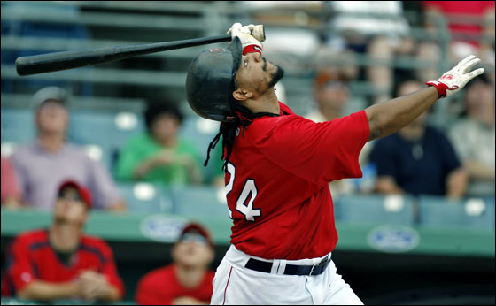 Red Sox slugger Manny Ramirez fouled out during his first at bat in this afternoon's game at City of Palms Park vs. Toronto, here he watches the flight of the ball.