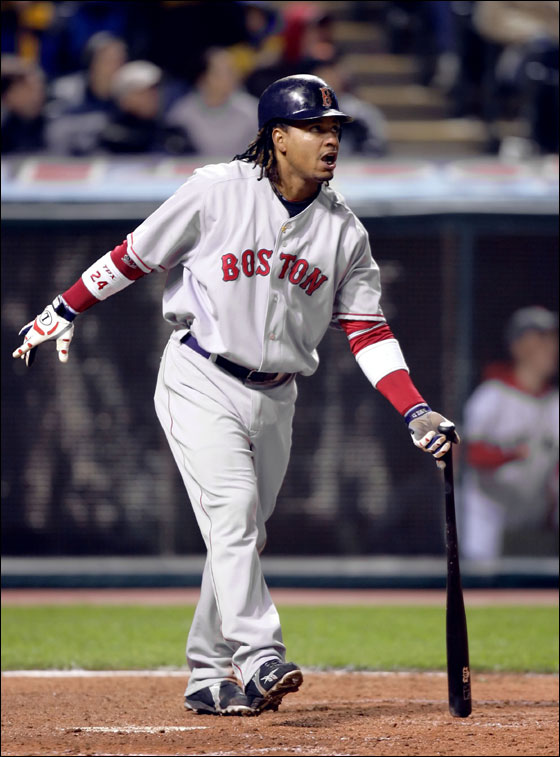 Boston Red Sox slugger Manny Ramirez watches his three-run homer off Cleveland Indians pitcher Guillermo Mota in the eighth inning of a Major League baseball game Tuesday, April 25, 2006, in Cleveland.
