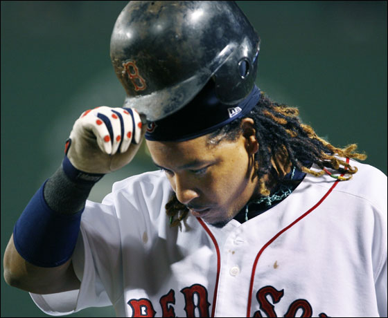 9.6.06: It was a dark night at the plate for the Red Sox, here Manny Ramirez looks glum as he heads back to the dugout after grounding out to shortstop in the bottom of the fourth inning.