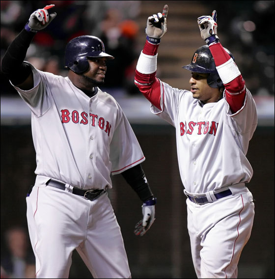 Red Sox's David Ortiz (left) and Manny Ramirez celebrate Ramirez's eighth-inning, three-run homer off Cleveland Indians pitcher Guillermo Mota in a Major League baseball game Tuesday, April 25, 2006, in Cleveland.