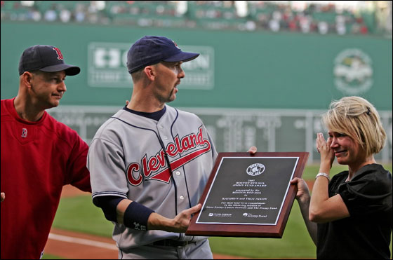 The Boston Red Sox manager Terry Francona present the Cleveland Indians outfielder Trot Nixon and his wife, Kathryn Nixon a plaque for their contributions to the Jimmy Fund before the start of their game at Fenway Park Monday May. 28 2007.
