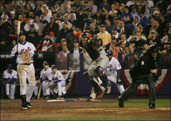 Catcher Yadier Molina #4 of the St. Louis Cardinals reacts after Carlos Beltran #15 of the New York Mets stikes out to end game seven of the NLCS at Shea Stadium on October 19, 2006 in the Flushing neighborhood of the Queens borough of New York City. The Cardinals won 3 to 1.