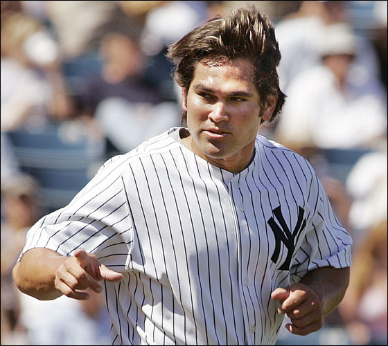 New York Yankees Johnny Damon runs for a double during his first at bat against the Philadelphia Phillies in Tampa, Florida March 2, 2006. The Yankees lost their opening day spring training game to the Phillies 6-3 at Legends Field.