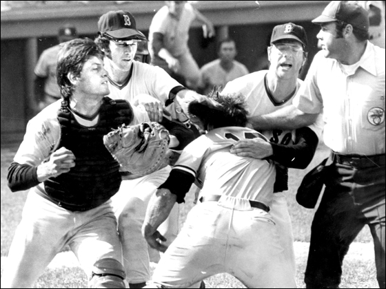 Globe file photo 8/1/1973. Red Sox Carlton Fisk and Yankees Thurmon Munson as they collide at home plate. In back, Red Sox players Doug Griffin and John Curtis attempt to pull Munson away from fight at the plate.