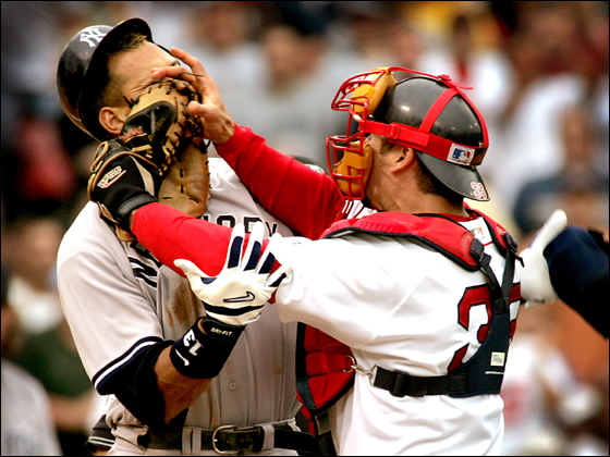 7/24/04: Alex Rodriguez of the Yankees and Red Sox catcher Jason Varitek trade blows in the third inning that precipitated a bench clearing brawl between the two teams. Both players were ejected from the game.