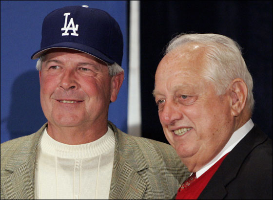 Los Angeles Dodgers' Tommy Lasorda, right, stands by Grady Little following a press conference where Little was introduced as the new team manager during the winter baseball meetings on Tuesday