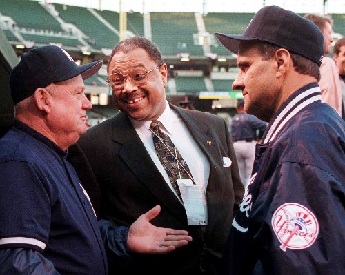 New York Yankees coach Don Zimmer, from left, general manager Bob Watson and manager Joe Torre talk before the start of Game 4 of the American League Championship Series Saturday, Oct. 12, 1996 at Oriole Park at Camden Yards in Baltimore. 