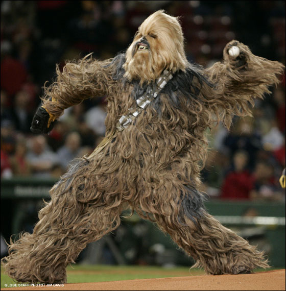 The Star Wars character Chewbacca throws out a ceremonial first pitch prior to the game as part of a promotion for an exhibit at the Museum of Science.
